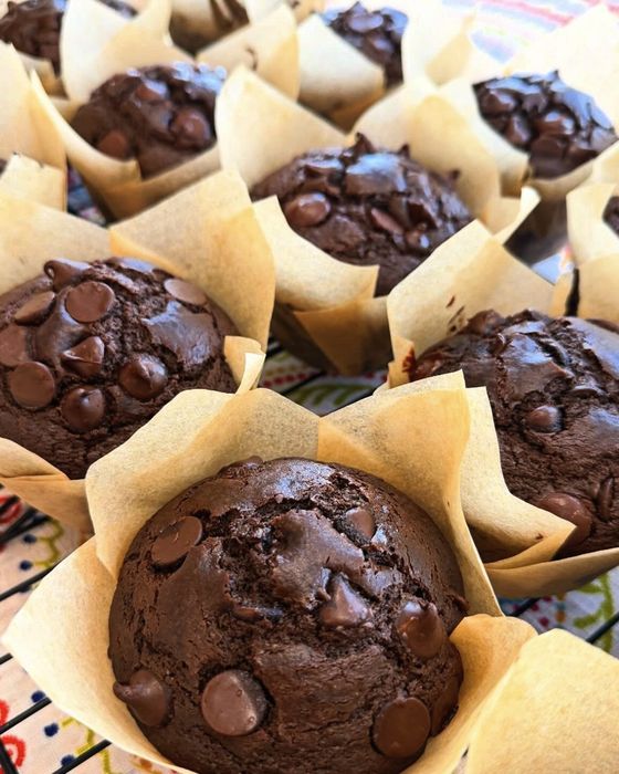 Double chocolate chip muffins in parchment tulip wrappers